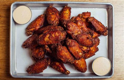 Elevate your dining experience with our magical wing options at Hudson Ave